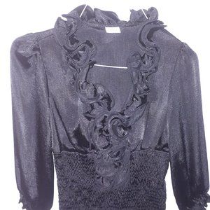 NWOT Suzy shier size small fashion statement blouse.